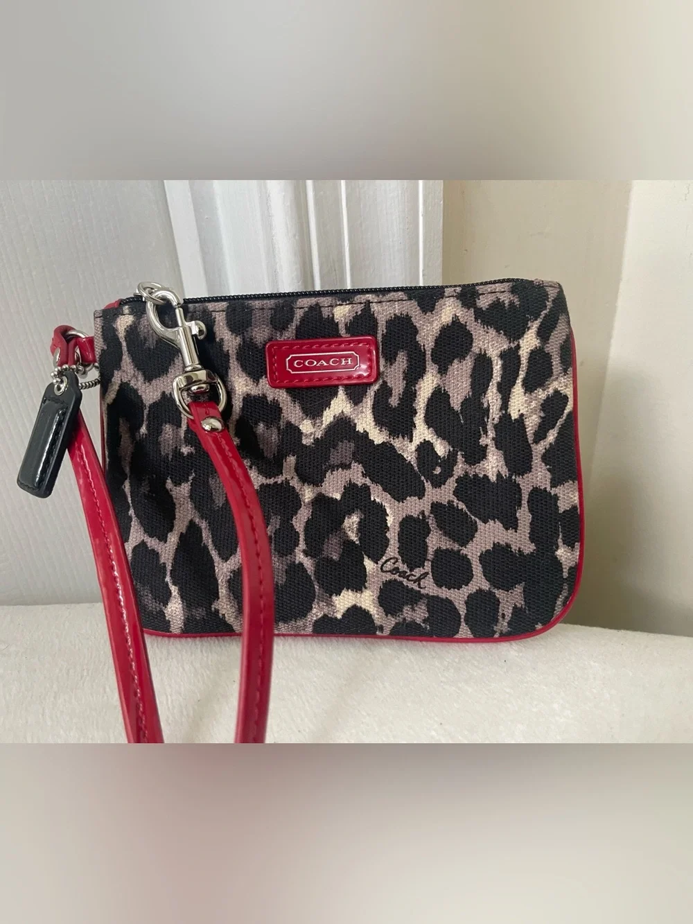 Coach Leopard Print Wristlet with Red Trim and Strap
